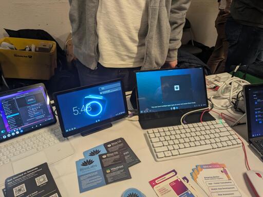 Showroom table showing off Lindroid, Bliss OS, and Bass OS
